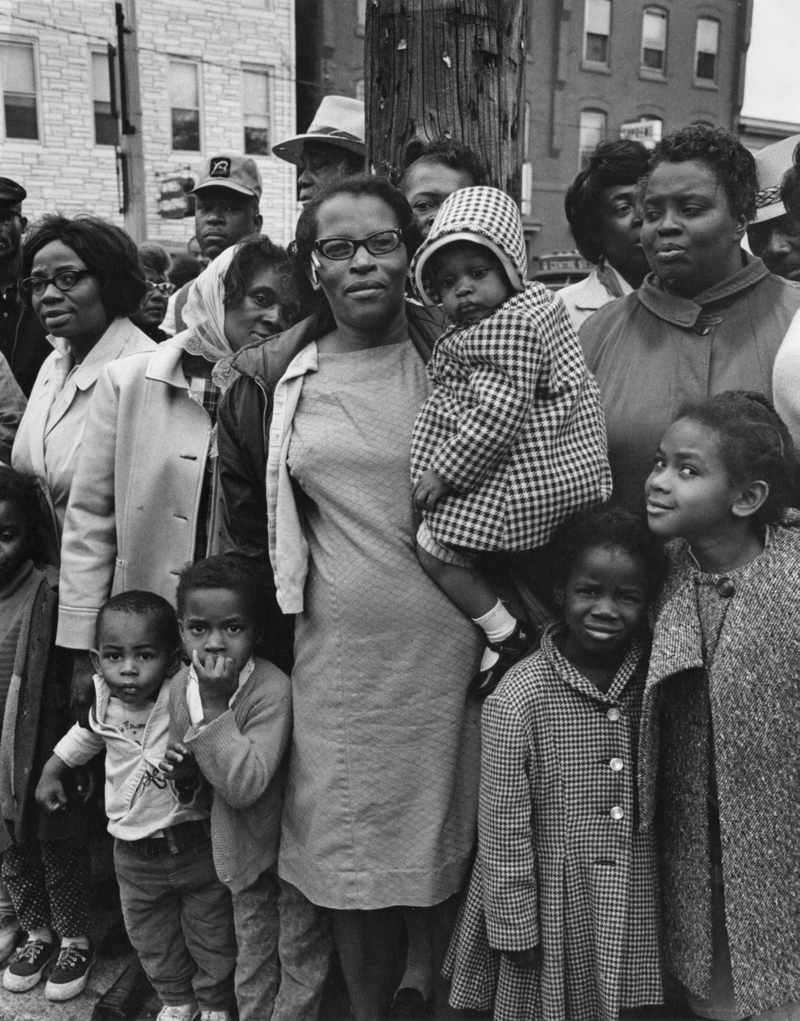 “This is the Poor People’s Campaign, 1968, but in Paterson, New Jersey. The people were out on the street, watching us march on our way to Washington. So we marched through six different towns on the way down. We’d sleep in their homes and churches.” 1968.
